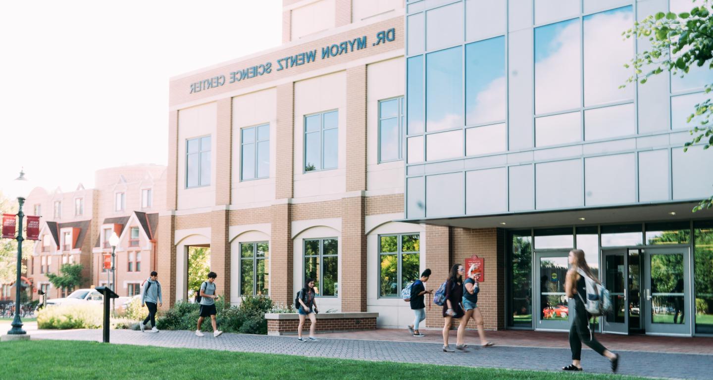 student walking on campus